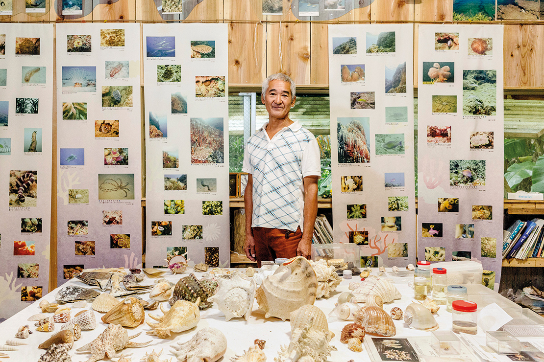 A member of a local diving team in Okinawa, Japan. The diving team monitors Oura Bay and documents what will be lost with the building of a proposed US military airstrip. Credit: Ian Teh.